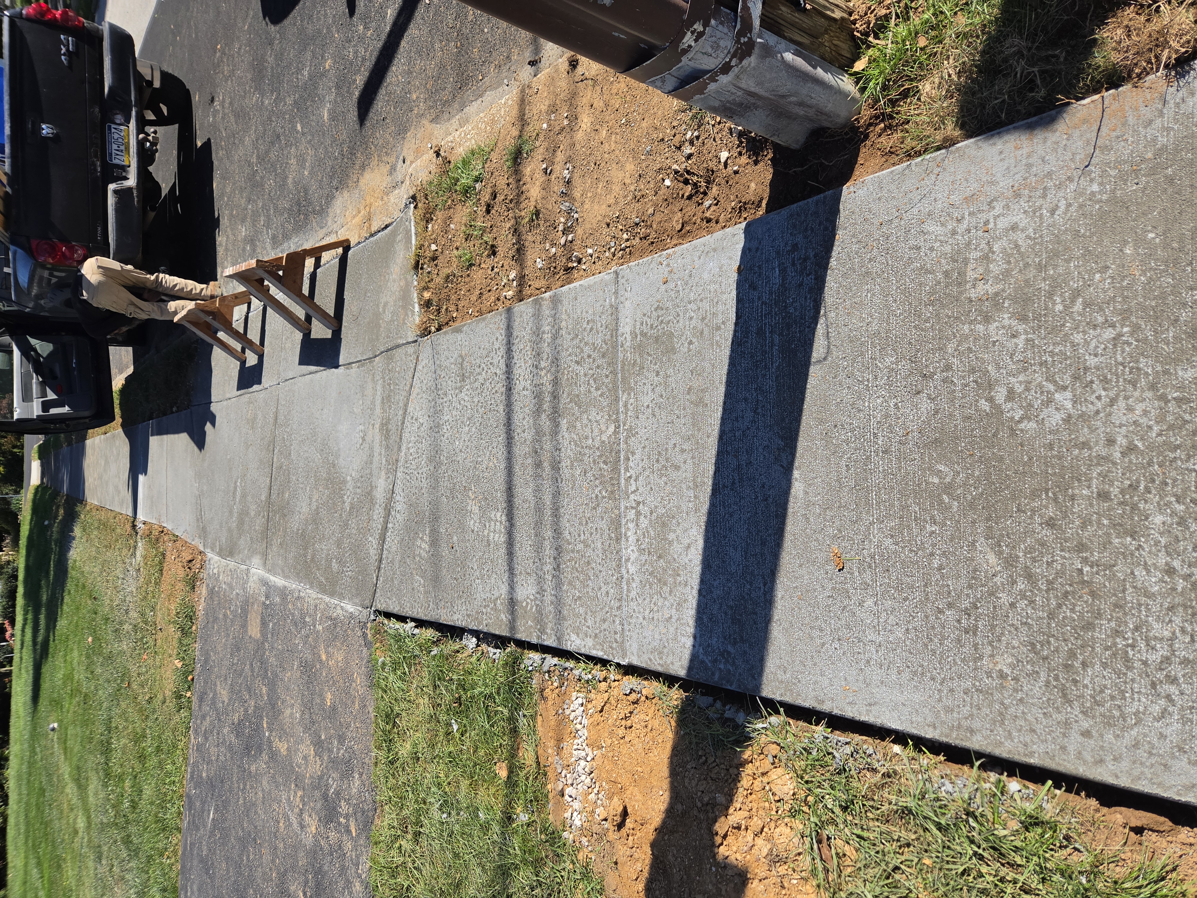 New broom finish concrete sidewalk in Paoli PA